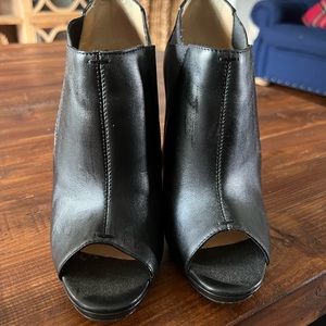 CHRISTIAN LOUBOUTIN
Bootstagram Red Sole Peep-Toe Bootie, Black